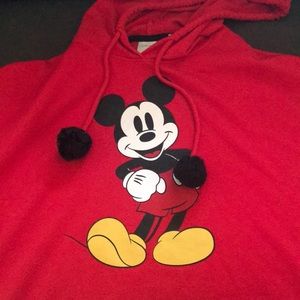 sweater with mickey mouse and pompoms on it